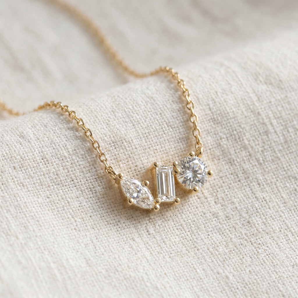 Elegant Three Stone Diamond Pendant Necklace