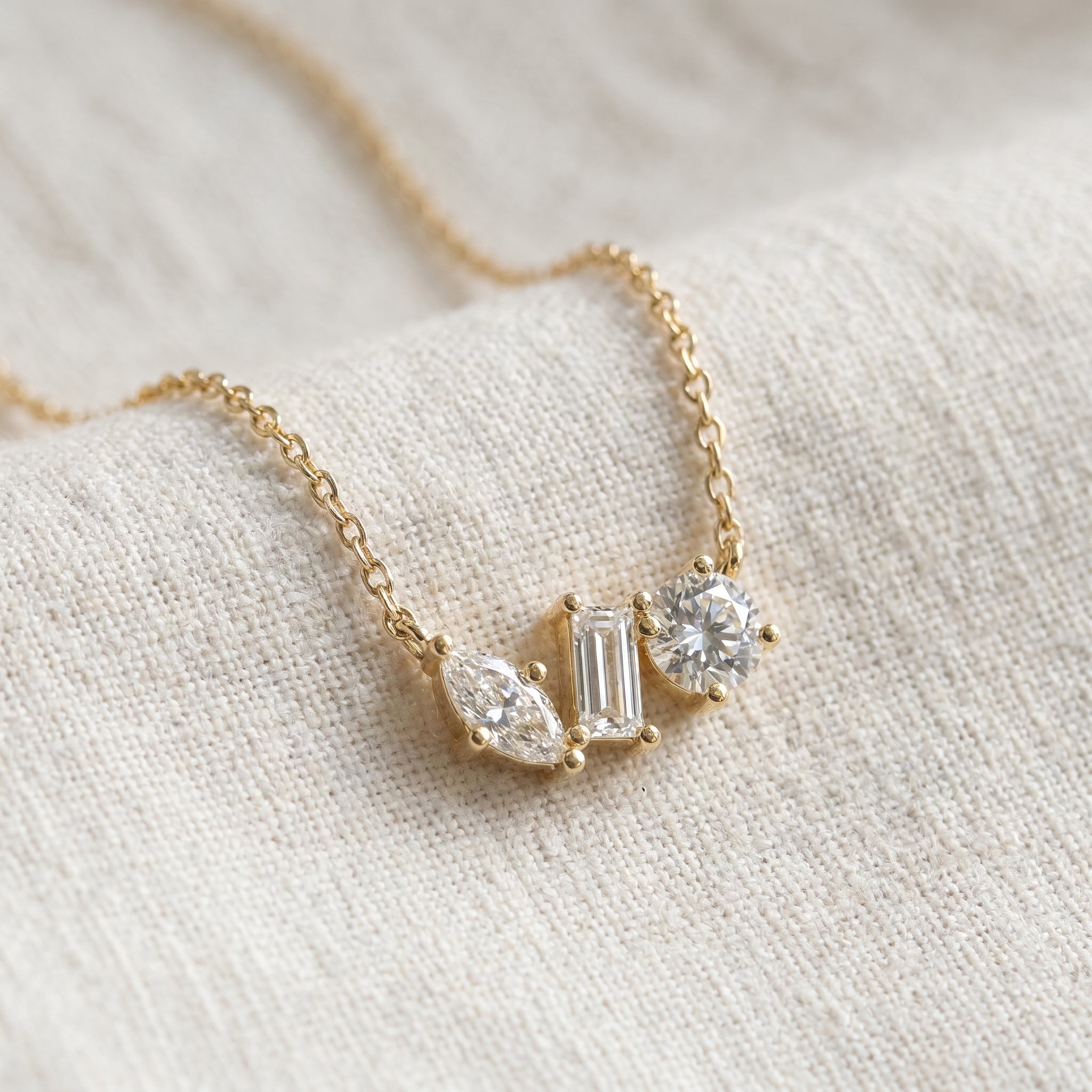 Elegant Three Stone Diamond Pendant Necklace