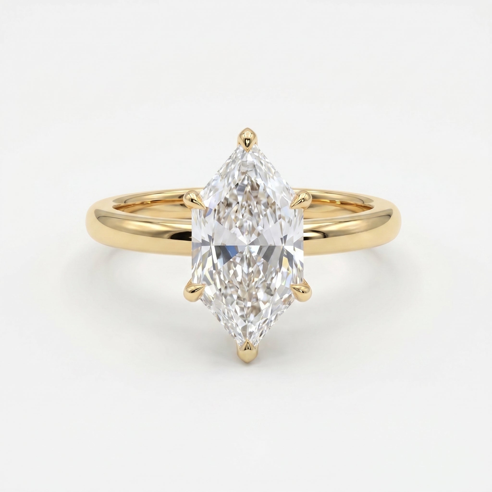 Front view of marquise cut diamond engagement ring featuring six-prong yellow gold solitaire setting