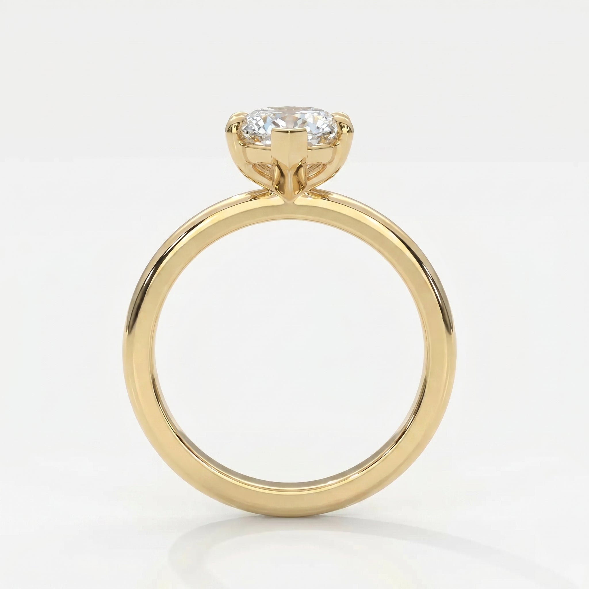 Side profile of marquise diamond engagement ring showing elevated cathedral setting and yellow gold band.