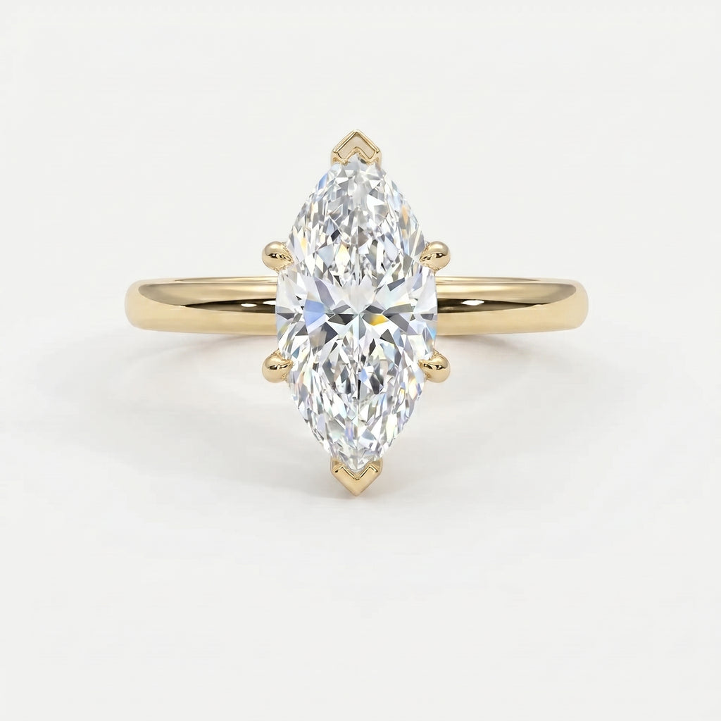 Marquise cut solitaire engagement ring in polished yellow gold with six-prong setting and brilliant center stone.