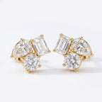Minimalist diamond cluster stud earrings worn on ear in elegant everyday luxury styling