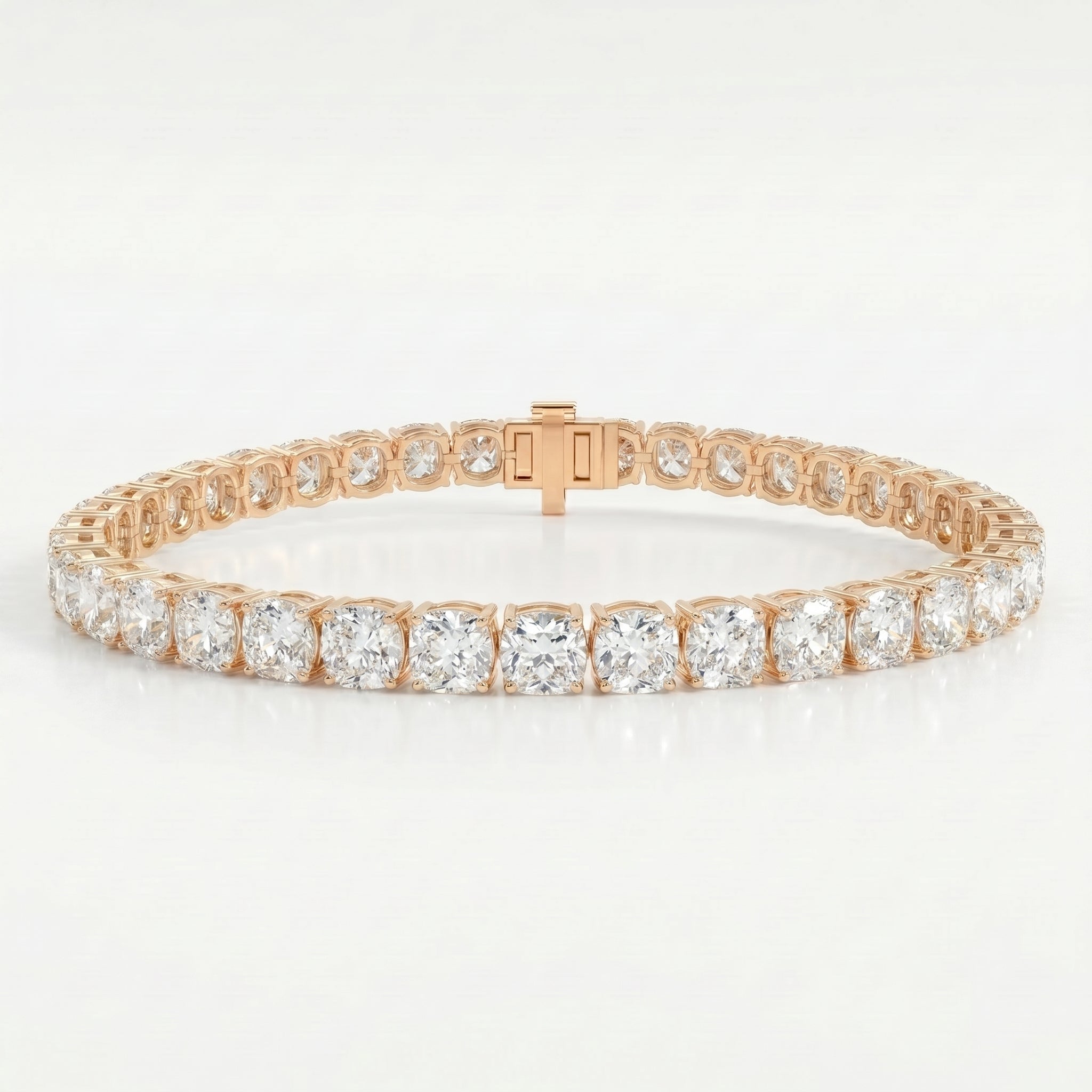 Rose gold tennis bracelet with round brilliant-cut stones in secure prong setting on clean white background