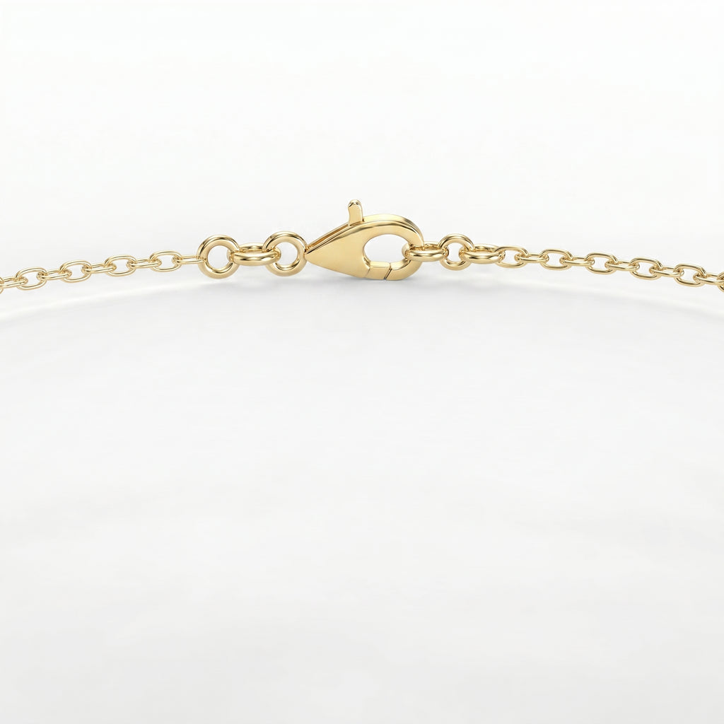 Close-up of round brilliant solitaire stone on delicate yellow gold bracelet with luxury finish