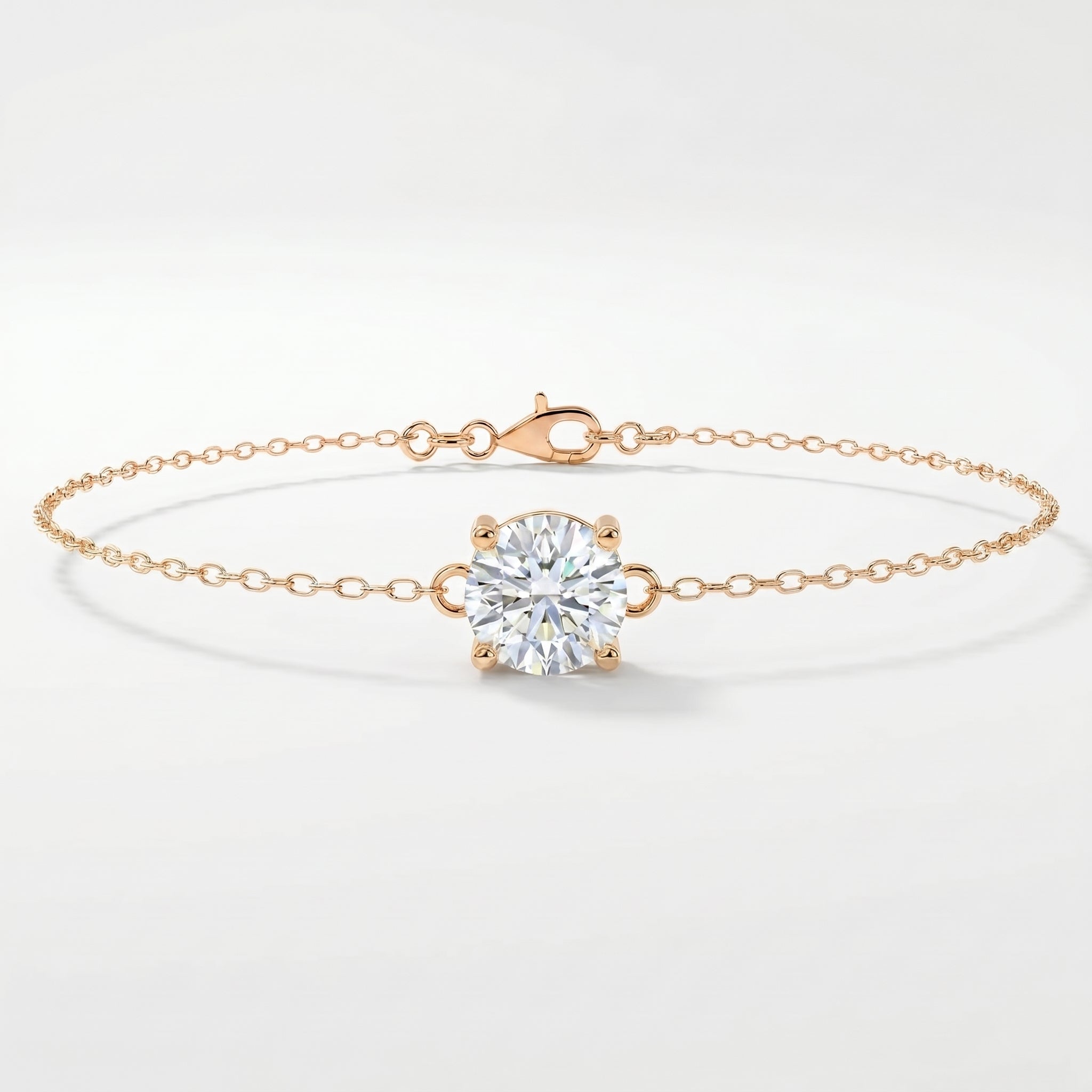 Minimalist rose gold solitaire bracelet with round brilliant gemstone on delicate fine chain