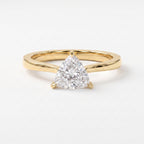 Minimalist triangle cut diamond solitaire engagement ring in polished yellow gold with elegant three-prong setting.