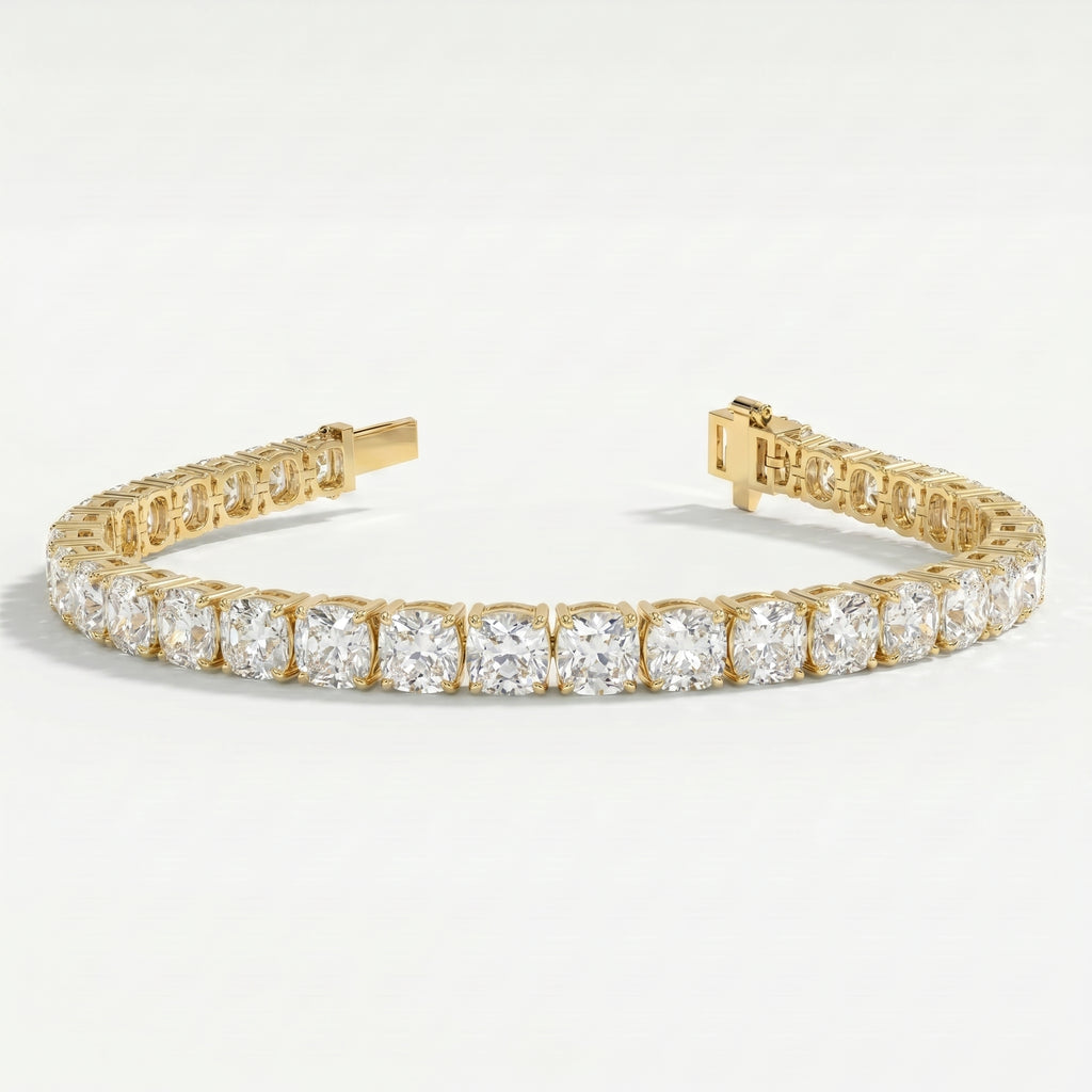 Yellow gold diamond tennis bracelet with open clasp showing secure locking mechanism and luxury jewelry construction.