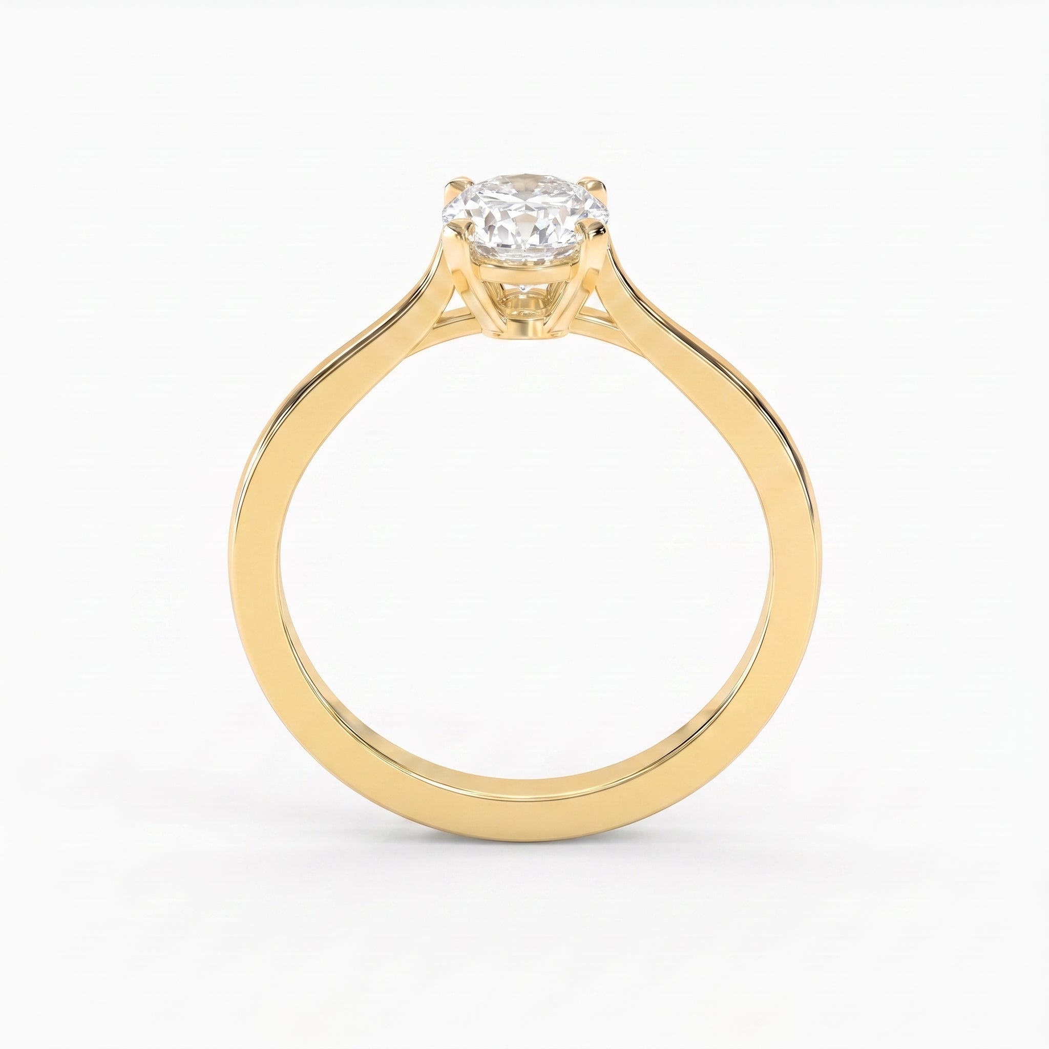 Front view of a yellow gold oval diamond solitaire engagement ring featuring a secure four-prong setting and elegant minimalist band.